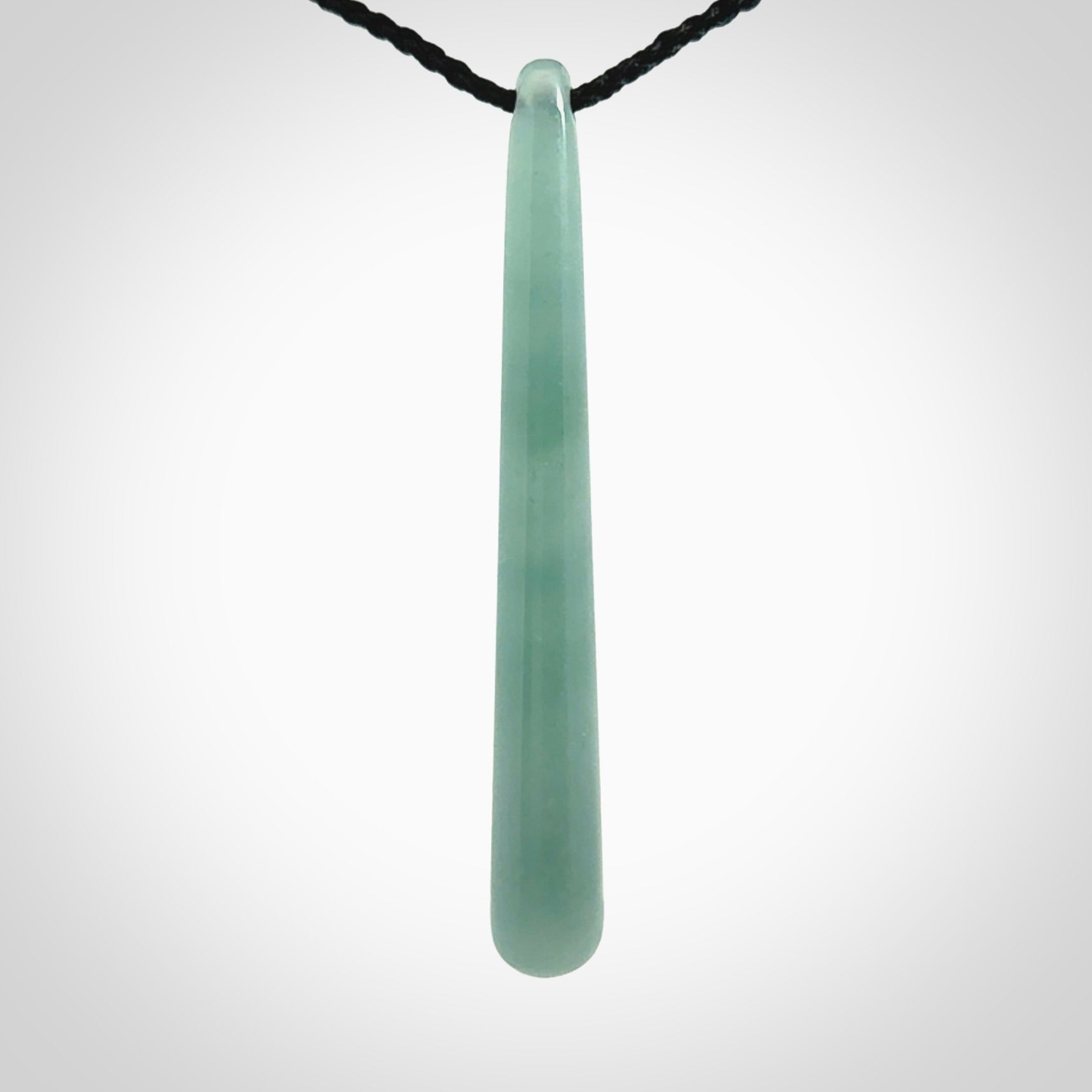 Hand carved large Guatemalan Jadeite drop pendant.