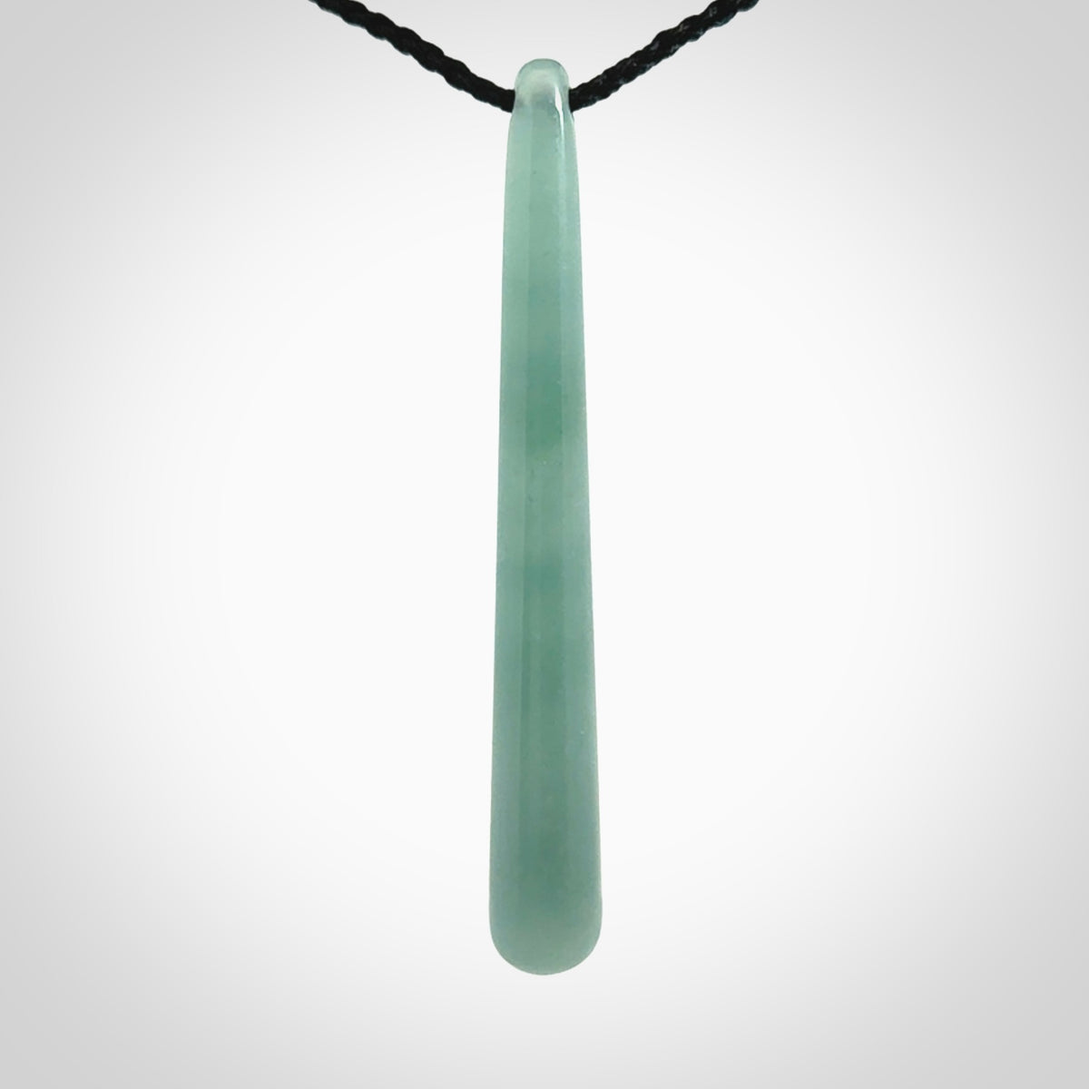 Hand carved large Guatemalan Jadeite drop pendant.