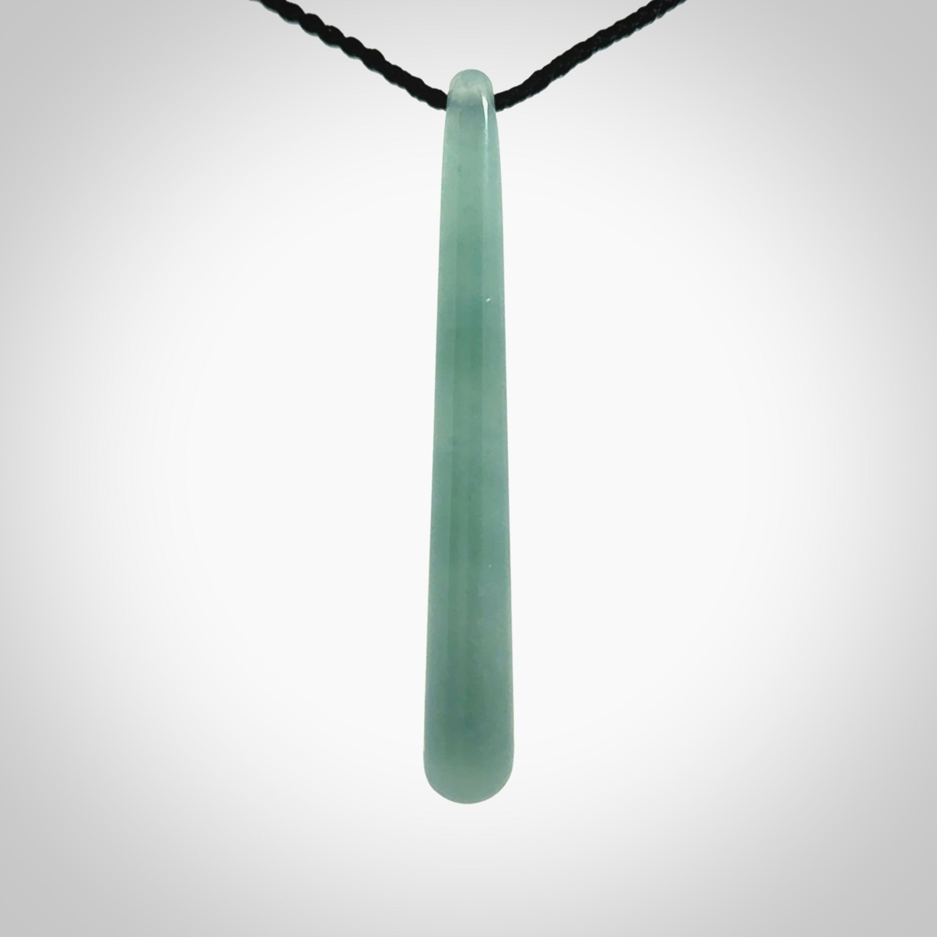 Hand carved large Guatemalan Jadeite drop pendant.