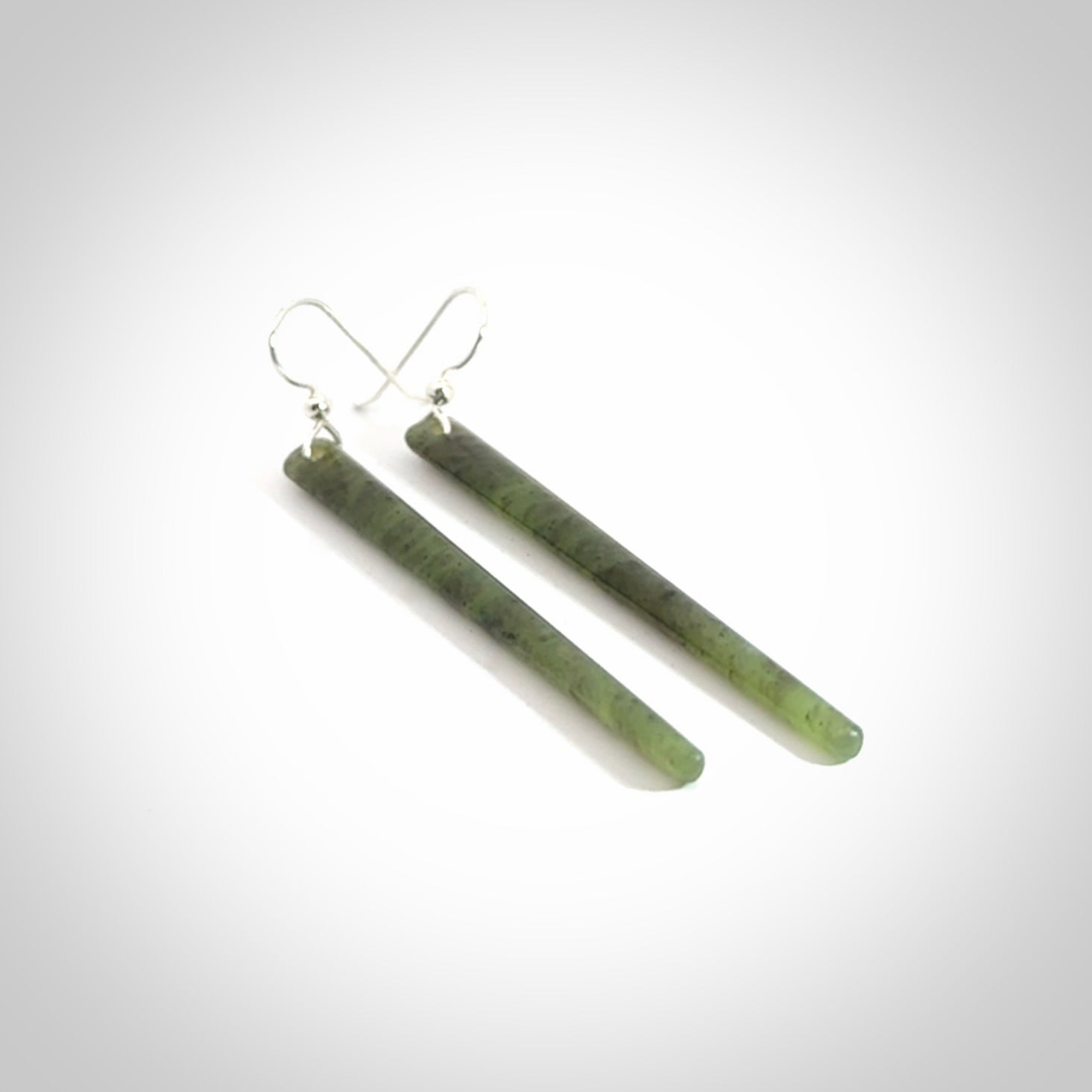 Hand crafted large, New Zealand Jade drop earrings with Sterling Silver Hooks. Jade drop earrings, packaged in a woven kete pouch.