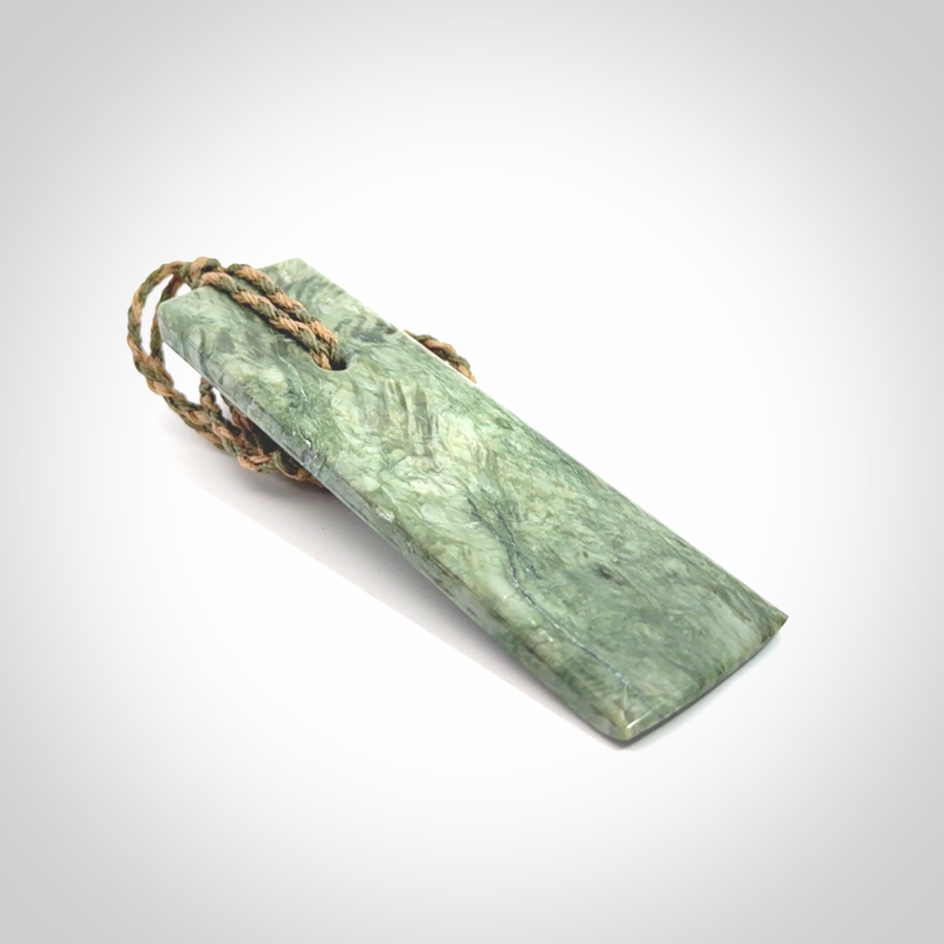 Hand made large New Zealand jade toki pendant.