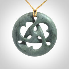 Hand carved New Zealand Nelson blue jade, complex twist drop pendant. Hand made complex twist pendant hand carved in New Zealand.