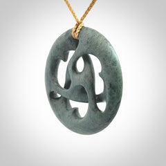 Hand carved New Zealand Nelson blue jade, complex twist drop pendant. Hand made complex twist pendant hand carved in New Zealand.