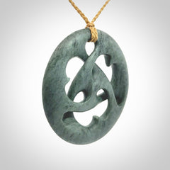 Hand carved New Zealand Nelson blue jade, complex twist drop pendant. Hand made complex twist pendant hand carved in New Zealand.