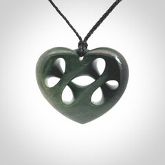Hand carved New Zealand jade, complex twist heart pendant.