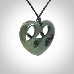 Hand carved New Zealand jade, complex twist heart pendant.