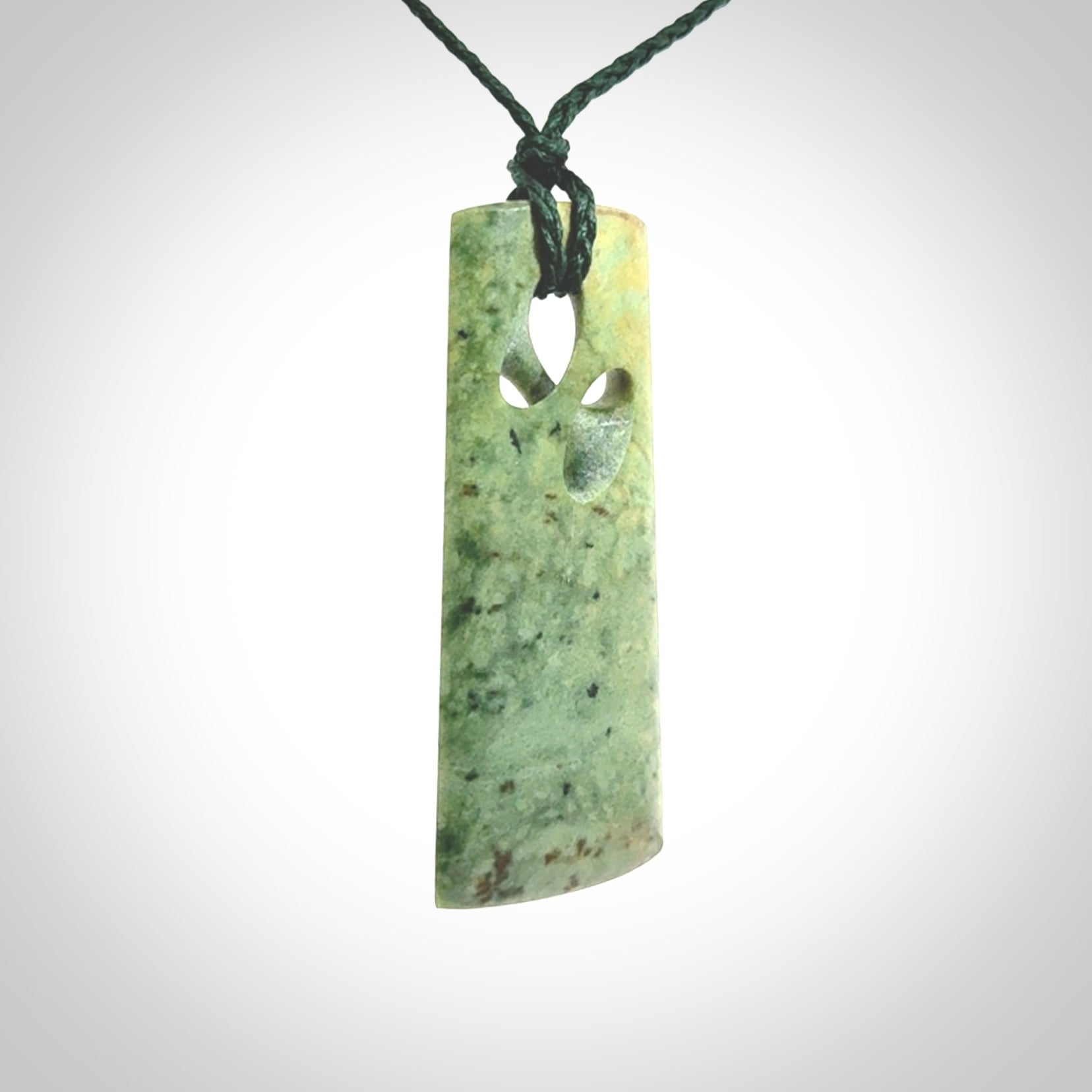 Hand carved New Zealand jade, complex twist pendant. Hand made complex twist pendant hand carved in New Zealand.