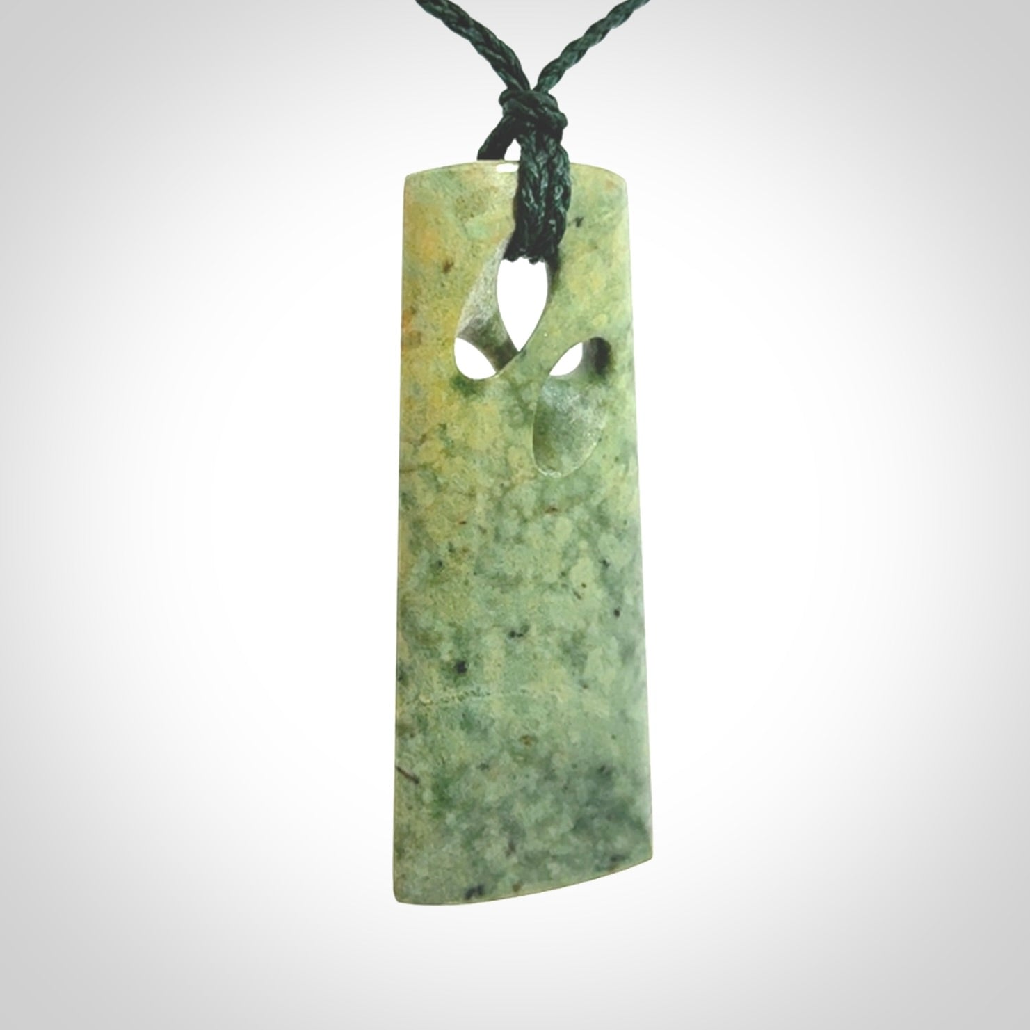 Hand carved New Zealand jade, complex twist pendant. Hand made complex twist pendant hand carved in New Zealand.