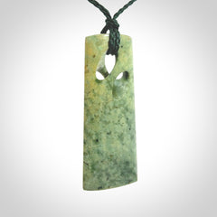 Hand carved New Zealand jade, complex twist pendant. Hand made complex twist pendant hand carved in New Zealand.