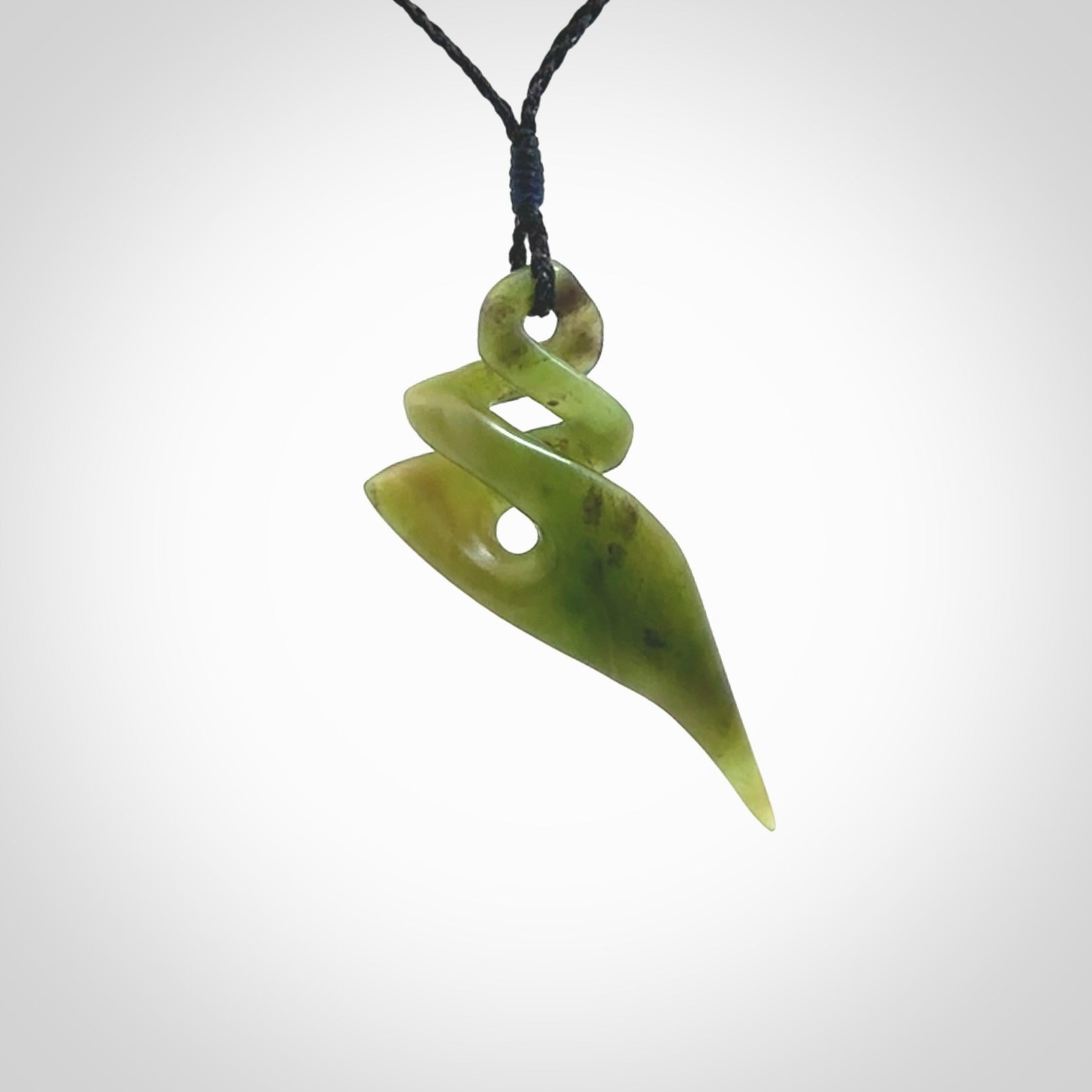 Hand carved large New Zealand jade twist pendant. Carved in New Zealand by NZ Pacific. Hand made Jade twist with adjustable black cord by Shaun Gardiner.