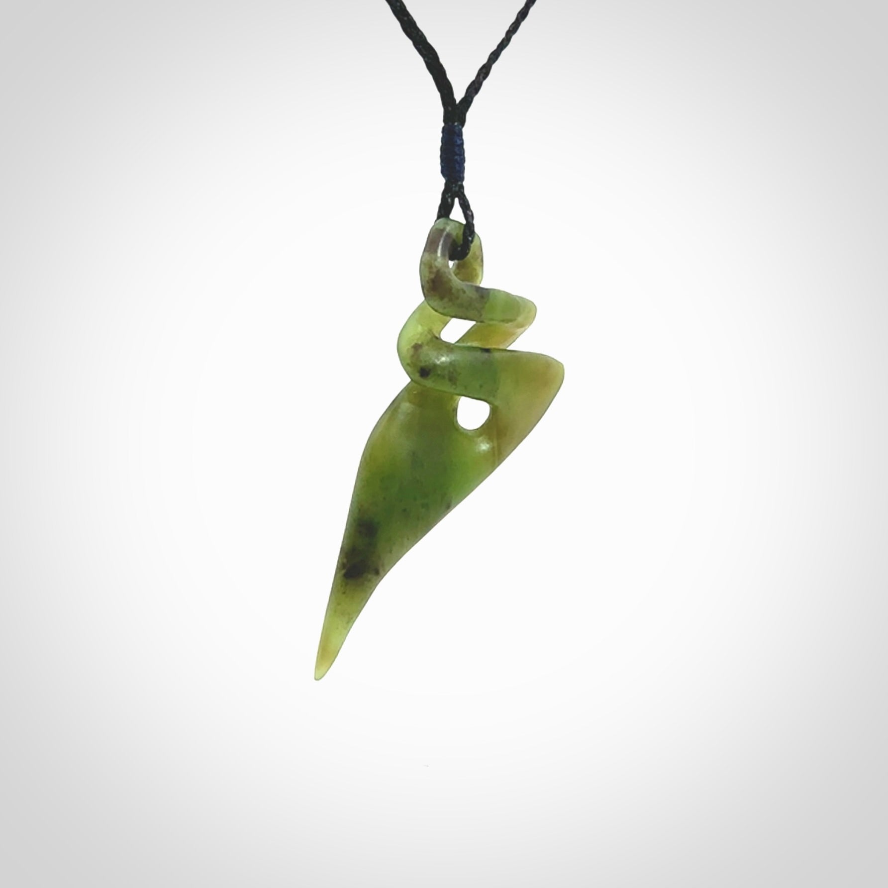 Hand carved large New Zealand jade twist pendant. Carved in New Zealand by NZ Pacific. Hand made Jade twist with adjustable black cord by Shaun Gardiner.