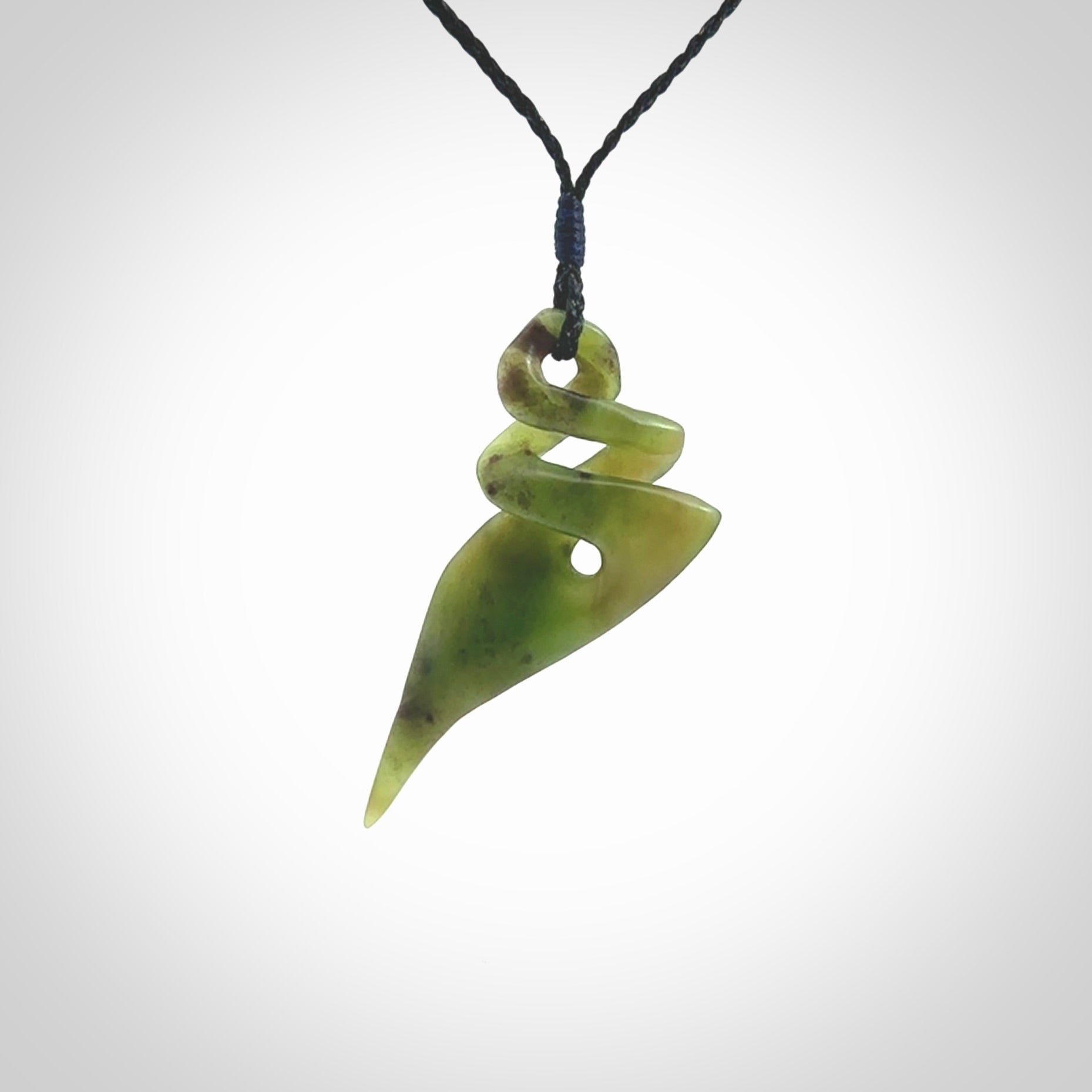 Hand carved large New Zealand jade twist pendant. Carved in New Zealand by NZ Pacific. Hand made Jade twist with adjustable black cord by Shaun Gardiner.