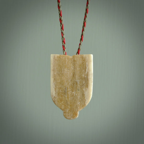 Hand carved Wheku pendant. Carved from deer antler by NZ Pacific. Hand crafted bone jewellery for sale online.