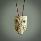 Hand carved Wheku pendant. Carved from deer antler by NZ Pacific. Hand crafted bone jewellery for sale online.