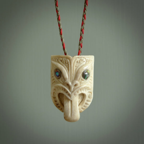 Hand carved Wheku pendant. Carved from deer antler by NZ Pacific. Hand crafted bone jewellery for sale online.