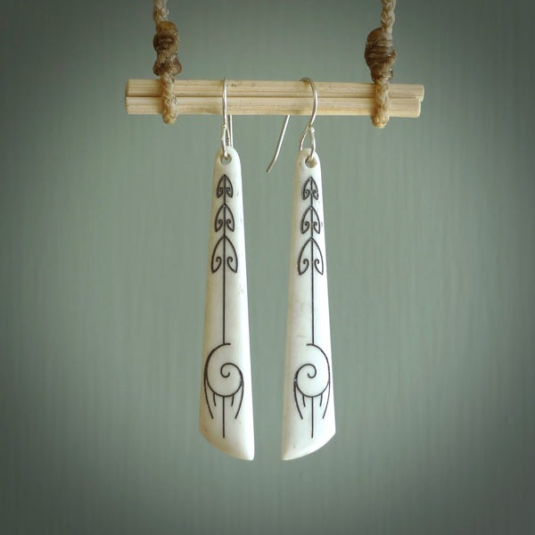 Hand carved large bone earrings with dreamcatcher engraving. Hand made by Kerry and Amanda Thompson. One only large bone Koru earrings. Real bone art to wear. Free Shipping worldwide.