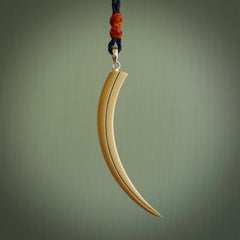 Hand carved incredible Huia bird beak woolly mammoth tusk carving. A stunning work of art, beautifully replicating a hula bird beak. This pendant was hand carved in mammoth tusk by artist Sami. A one off collectors item that has been hand crafted to be worn or displayed.