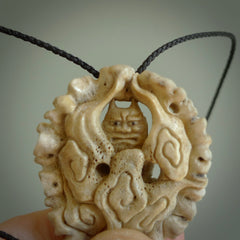 Hand carved Raiden Pendant. Made from Red Deer antler in New Zealand. Unique Japanese necklace hand made from deer antler by master bone carver Fumio Noguchi. Spectacular collectable work of art, made to wear. One only pendant, delivered to you at no extra cost with express courier.