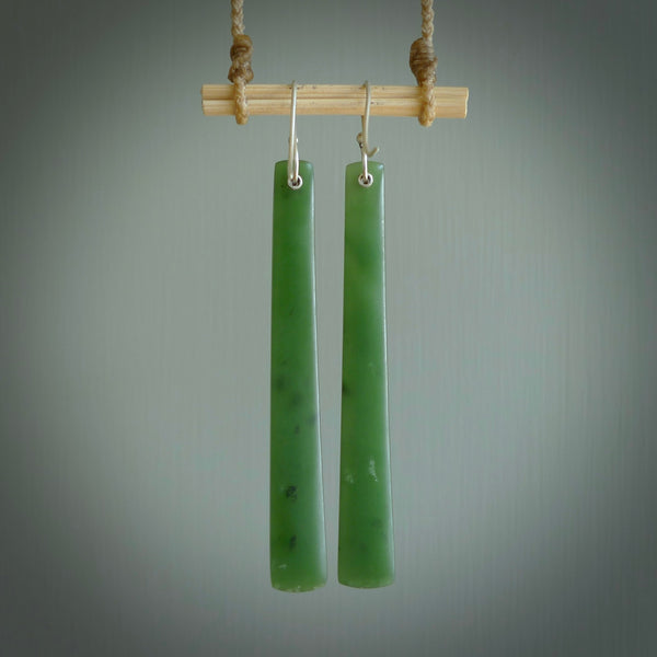 These are stunning large drop shaped jade earrings carved in New Zealand by Josey Coyle. It is carved from a apple green piece of New Zealand Jade and with Sterling Silver hooks.