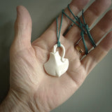 Hand carved stingray pendant. Natural bone pendants from NZ Pacific.