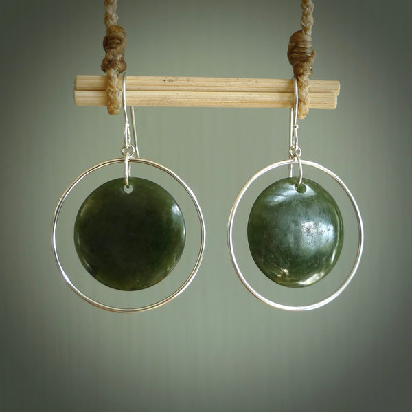Hand carved medium New Zealand jade circle earrings. Made by NZ Pacific from real jade. Online jewellery for sale online by NZ Pacific.