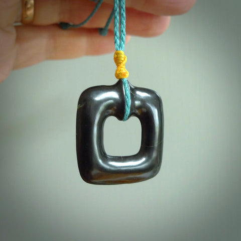 Contemporary pendant hand carved from Australian Black Jade. Designed and made by NZ Pacific. All hand carved jade.