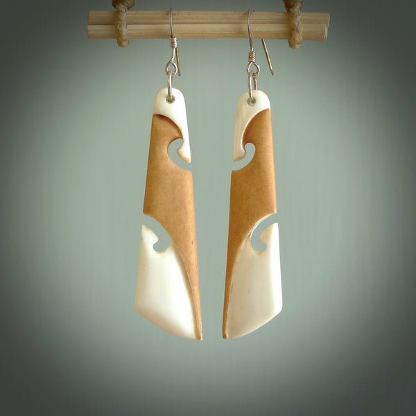 Hand carved large bone earrings with double koru. Hand made by Tj. One only large bone Koru earrings. Real bone art to wear. Free Shipping worldwide.
