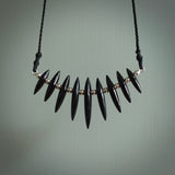 Red Jasper Stone drop pendant. Australian Black Jade drop pendant Handmade black jade and Jasper jewellery made by NZ Pacific and for sale online. Jasper stone for men and women. Unique art to wear from NZ Pacific.