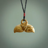 Hand carved whale tail pendant. Carved from woolly mammoth tusk in 10,000 year old mammoth tusk. A rare and original handmade pendant for ocean lovers.