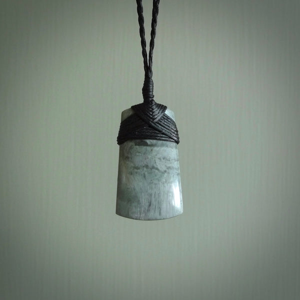 Hand made large New Zealand jade toki pendant. Hand carved in New Zealand by Raegan Bregmen. Hand made jewellery. Unique large Jade Toki with adjustable length black coloured cord. Free shipping worldwide.
