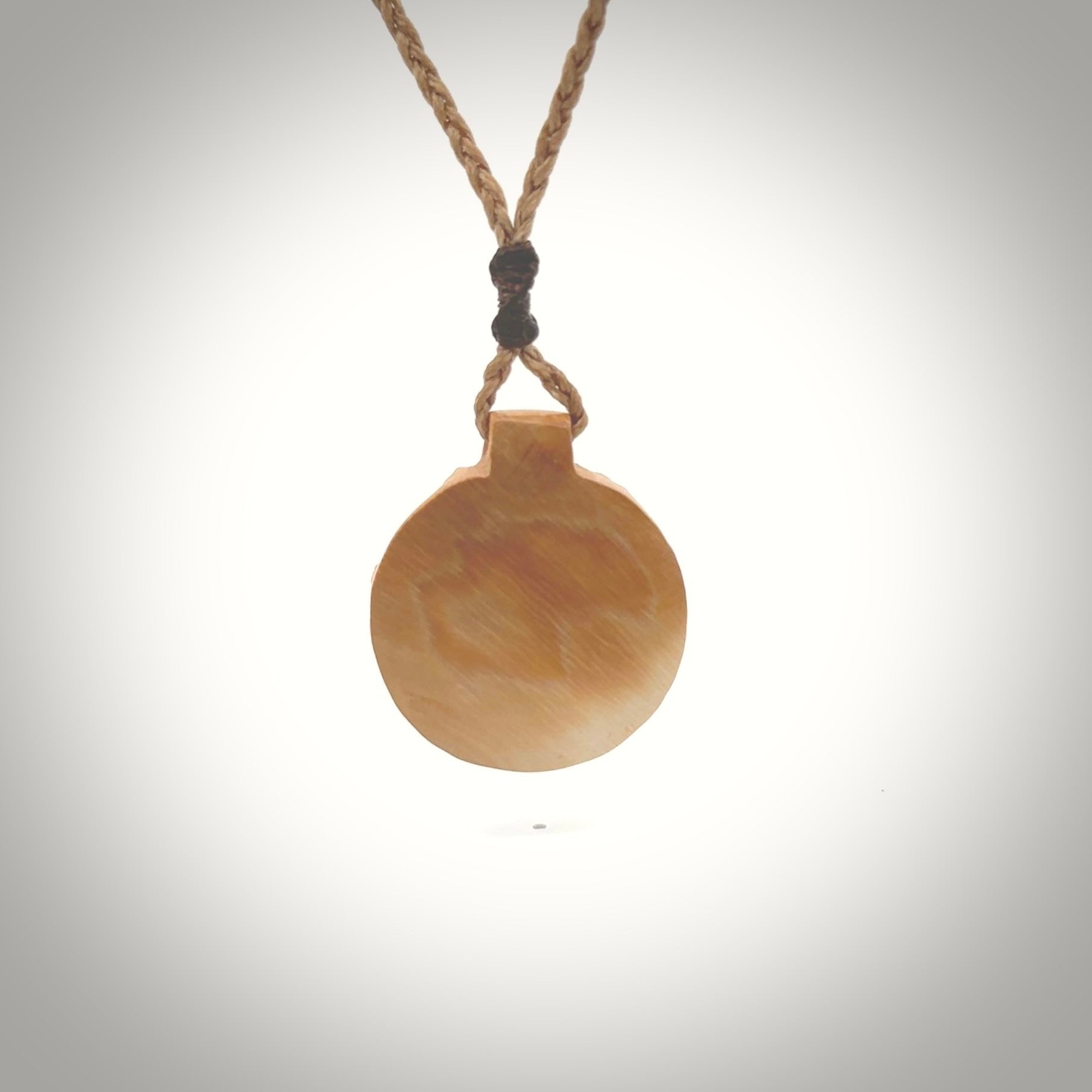 This is a handcarved pendant depicting a beetle on the front face. it is carved from Woolly Mammoth tusk and is a beautiful creamy, golden colour. A lovely and unique necklace for those of us who are fascinated with beetles.
