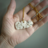 Hand carved tiki. Tiki Pendant made from deer antler by NZ Pacific. Ethnic handcarved jewellery for sale online.