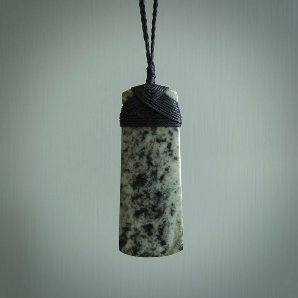 Hand made large New Zealand jade toki pendant. Hand carved in New Zealand by Raegan Bregmen . Hand made jewellery. Unique large Jade Toki with adjustable length black coloured cord. Free shipping worldwide.