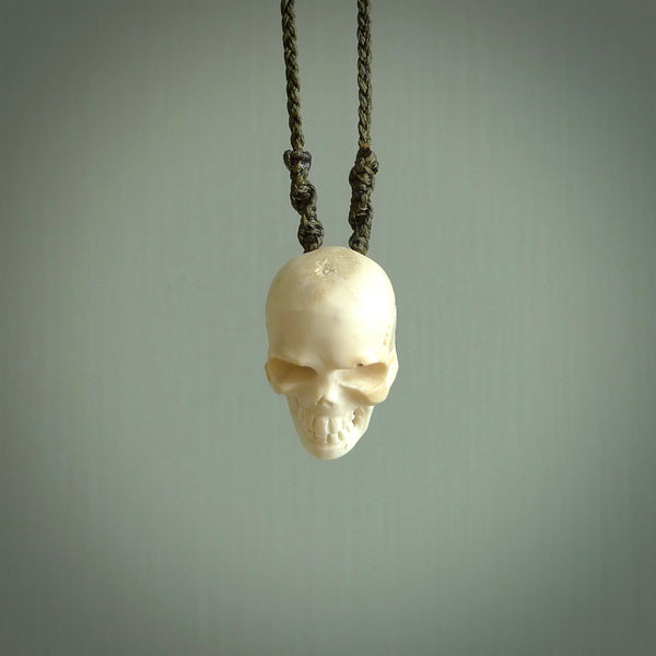 These are little handmade skull pendants carved from deer antler. A fantastic piece if you like skulls and would like a small piece. The cord is adjustable so you can wear this where it suits you best. We ship these free worldwide.