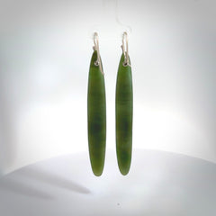 These are stunning large drop shaped jade earrings carved in New Zealand by Josey Coyle. It is carved from a apple green piece of New Zealand Jade and with Sterling Silver hooks.
