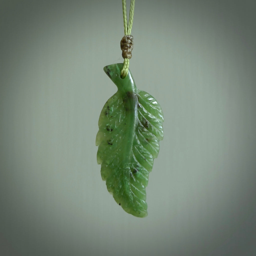 HAND CARVED NEPHRITE GREEN JADE FERN LEAF PENDANT. JADE FERN