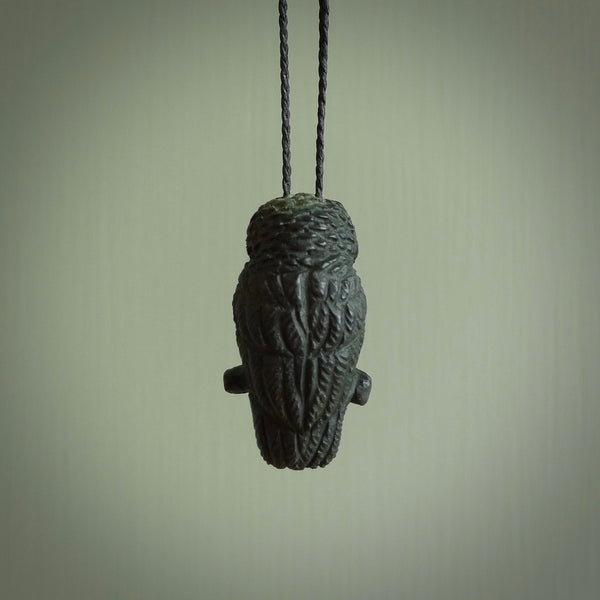 A traditional Owl design carving, hand made for us from Australian Black Jade. This is a work of art and is a collectable piece of traditional Black Jade carving. It can be worn as a special piece of jewellery or displayed. This is art made to wear at its finest. A unisex pendant for owl lovers.