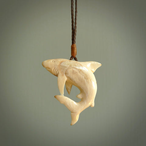 Hand carved mammoth tusk shark pendant. Great white shark pendant handmade from Woolly Mammoth. Made by NZ Pacific. Hand made jewellery for sale online.
