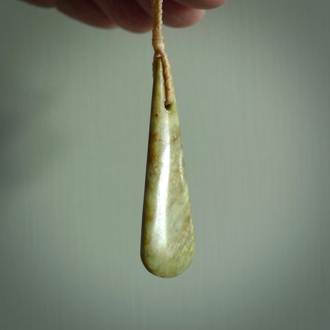 Hand carved pounamu drop pendant. Jade necklace hand made in New Zealand. A contemporary drop pendant carved from rare New Zealand flower jade. NZ Pacific jade jewellery for sale online.