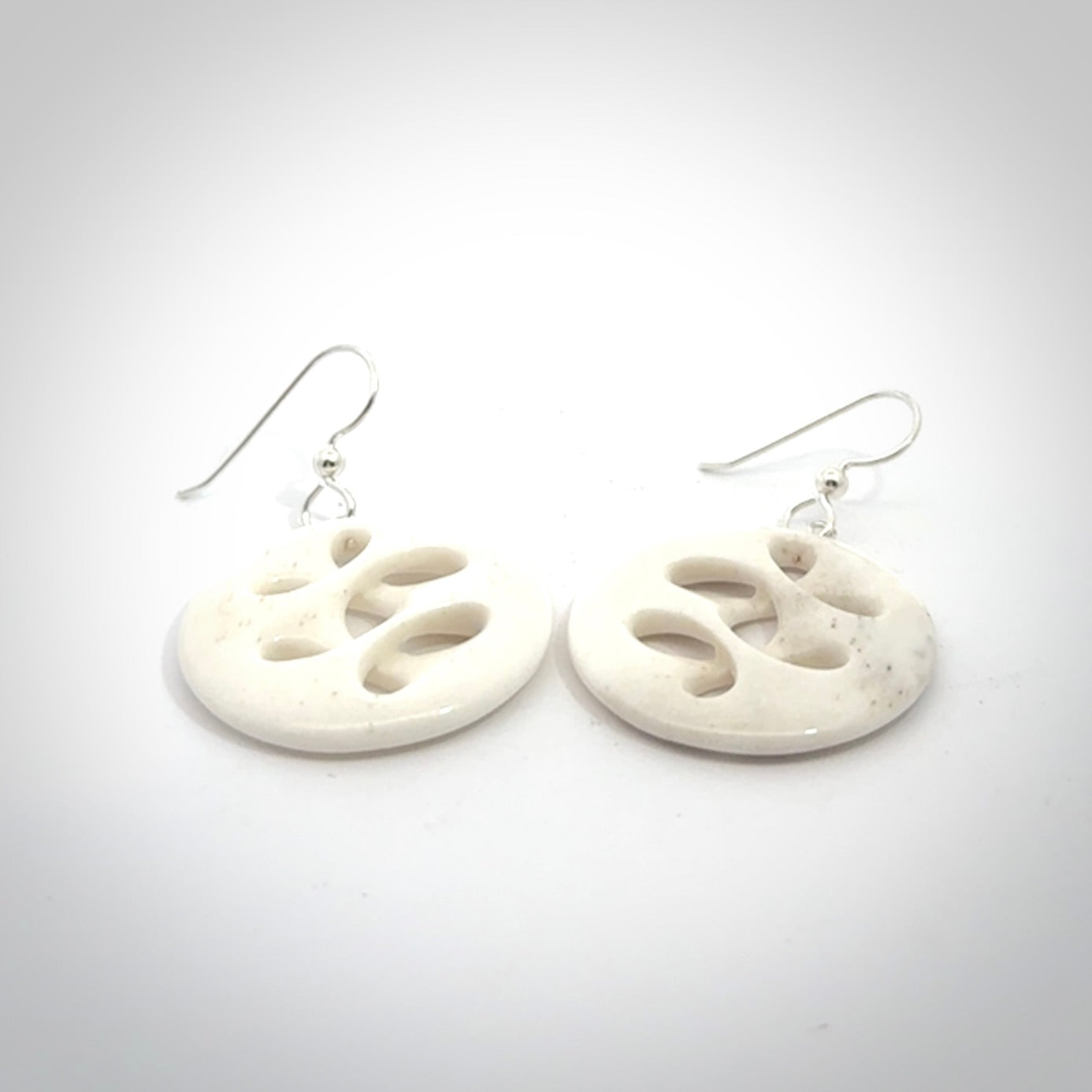 Hand carved bone earrings. Hand made by Amanda Thompson. One only bone earrings. Real bone art to wear. Free Shipping worldwide.