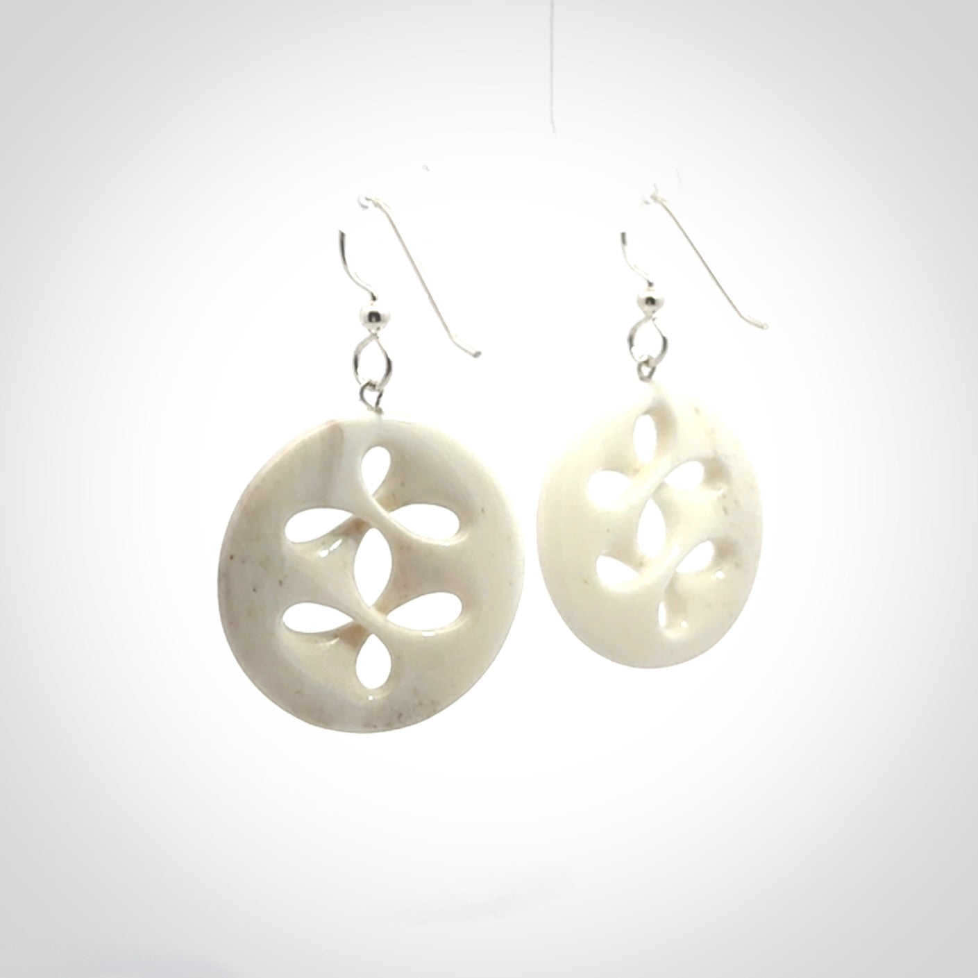 Hand carved bone earrings. Hand made by Amanda Thompson. One only bone earrings. Real bone art to wear. Free Shipping worldwide.