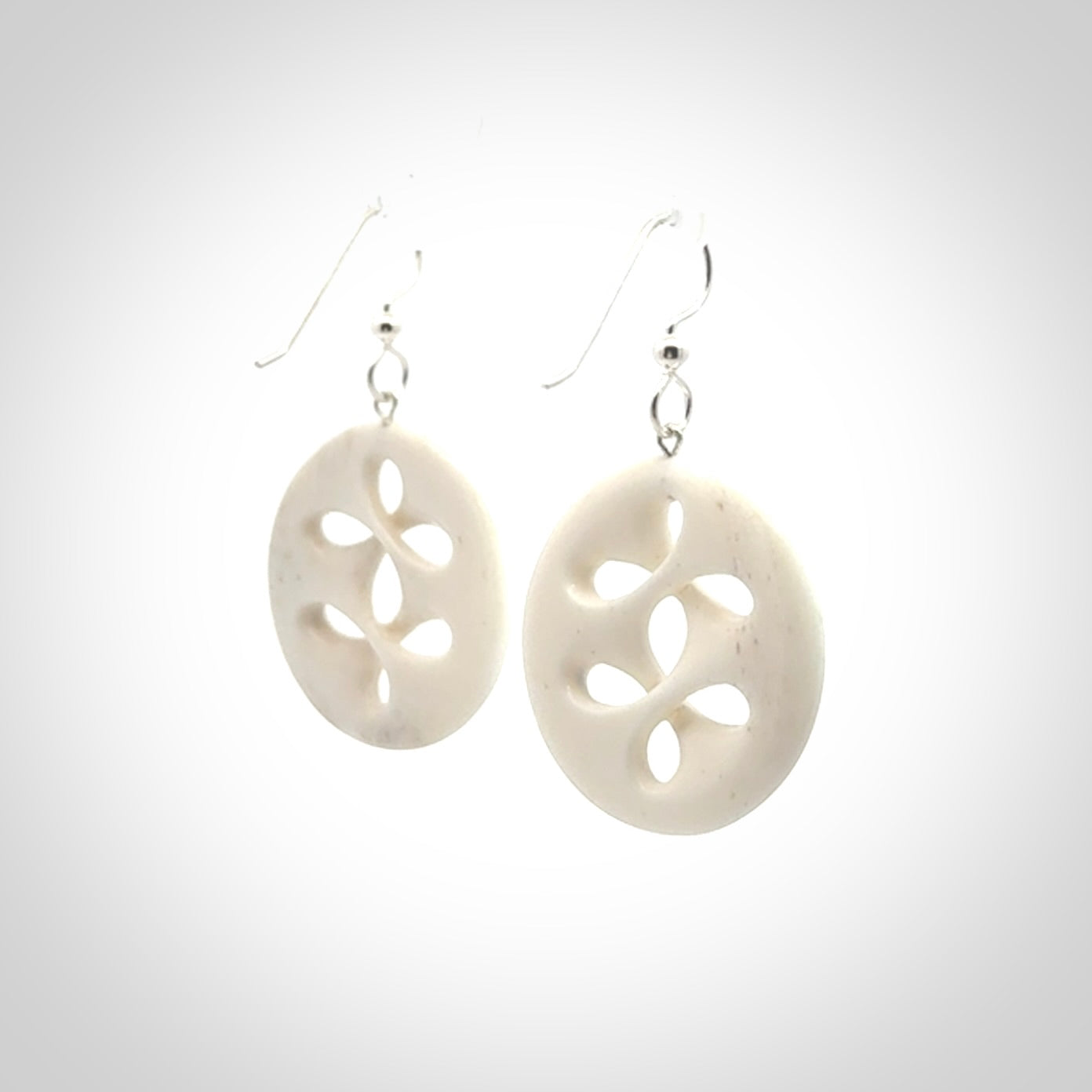 Hand carved bone earrings. Hand made by Amanda Thompson. One only bone earrings. Real bone art to wear. Free Shipping worldwide.