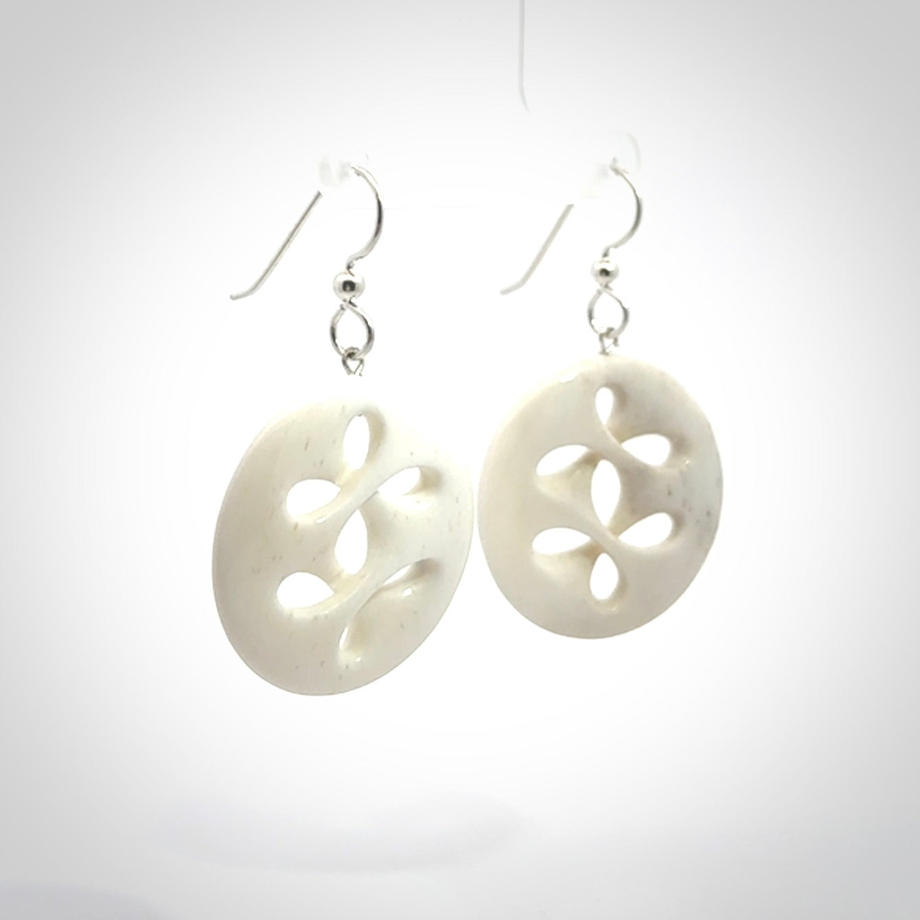 Hand carved bone earrings. Hand made by Amanda Thompson. One only bone earrings. Real bone art to wear. Free Shipping worldwide.