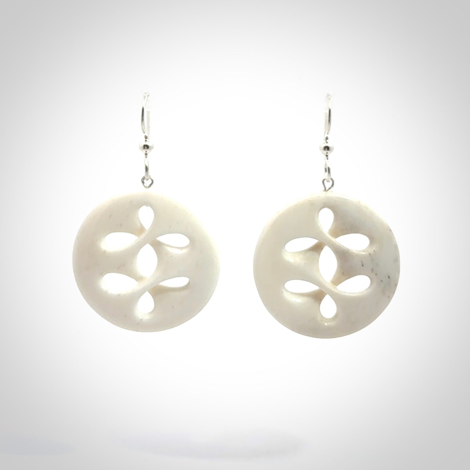 Hand carved bone earrings. Hand made by Amanda Thompson. One only bone earrings. Real bone art to wear. Free Shipping worldwide.