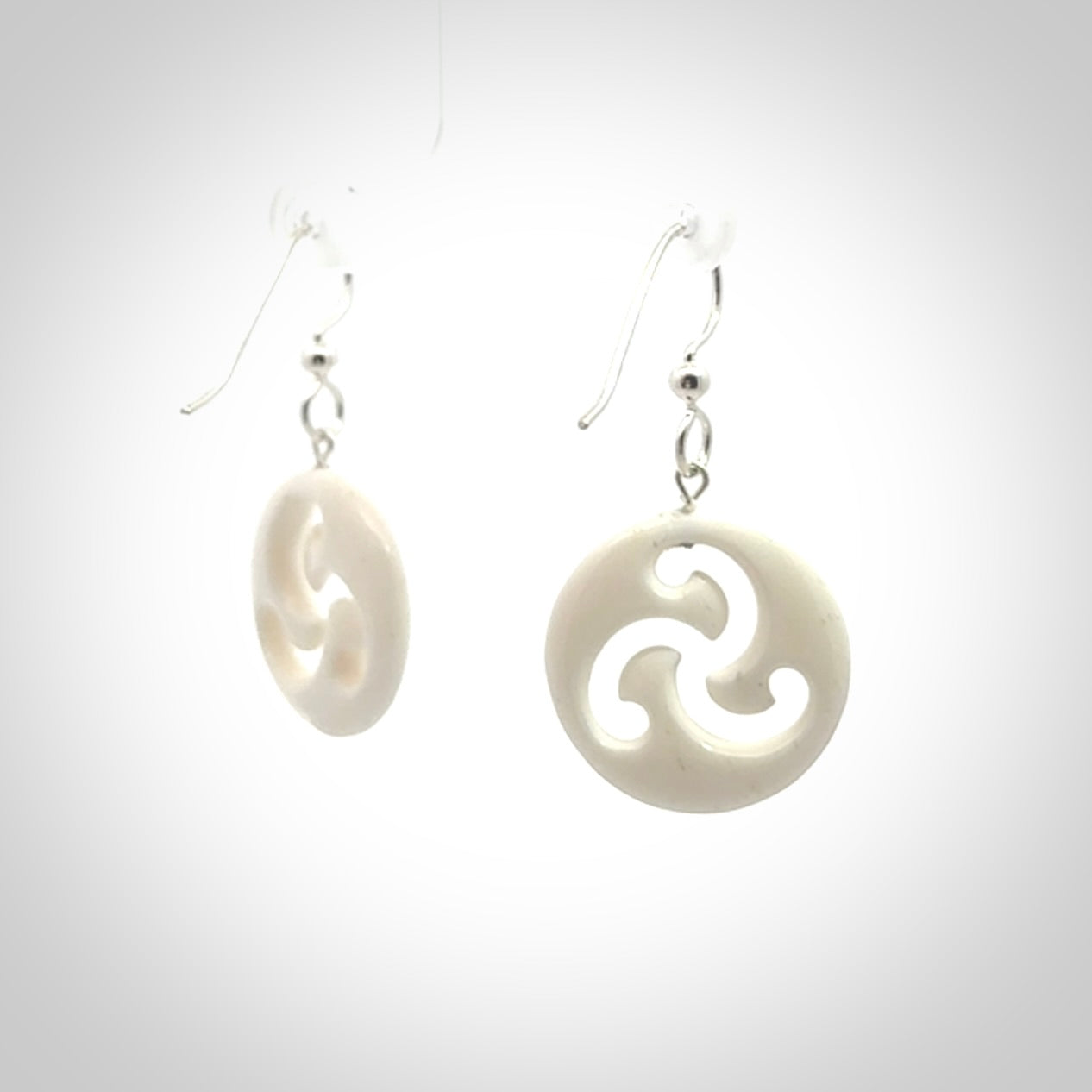 Hand carved bone earrings. Hand made by Amanda Thompson. One only bone earrings. Real bone art to wear. Free Shipping worldwide.