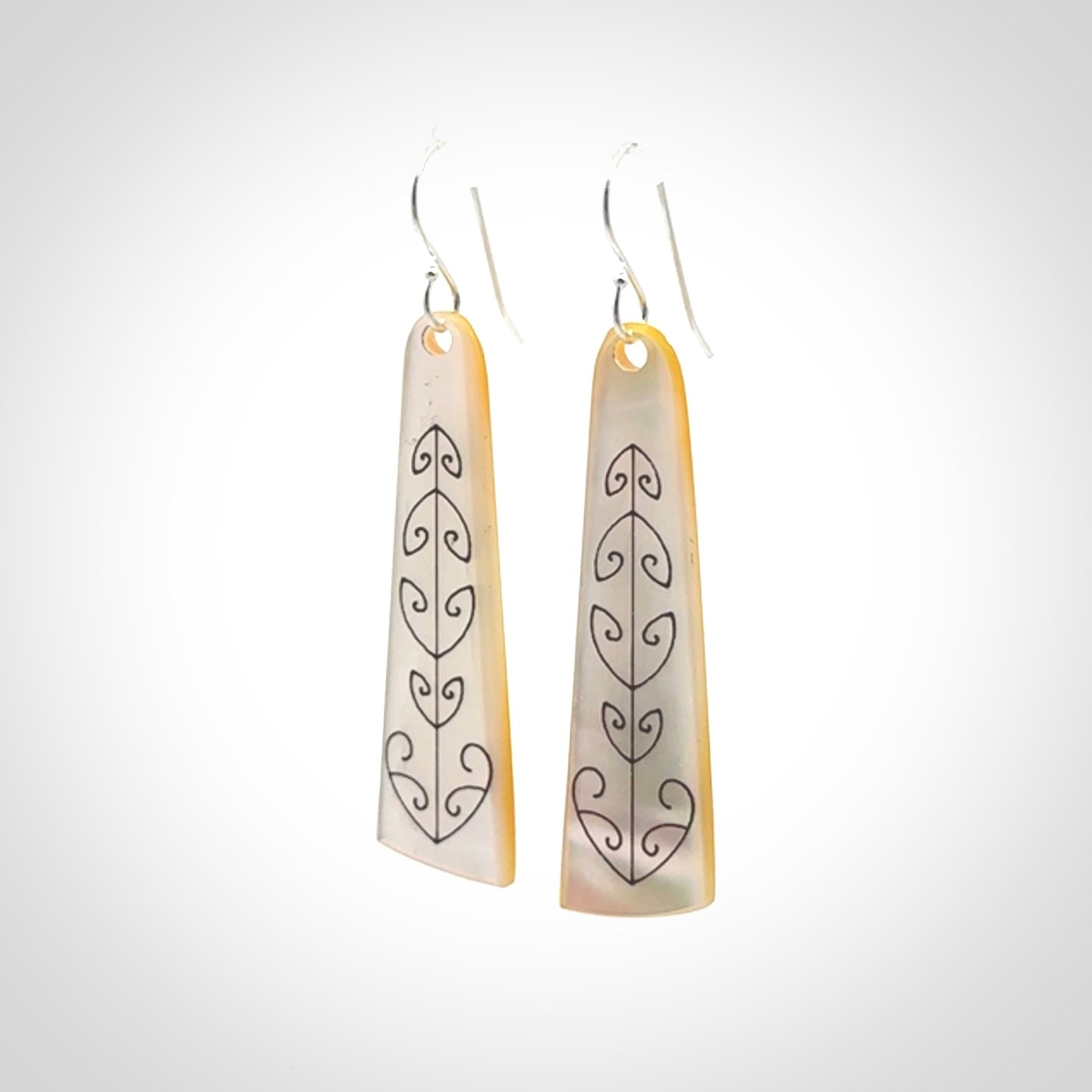Hand carved New Zealand mother of pearl drop, Koru earrings.