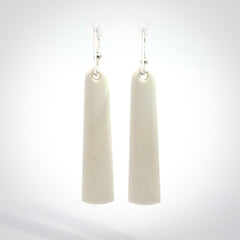 Hand carved large bone earrings with dreamcatcher engraving.