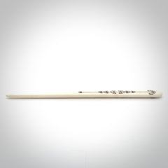 Hand carved bone hair pin with double sided koru design.