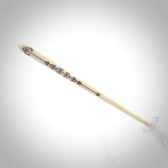 Hand carved bone hair pin with double sided koru design.