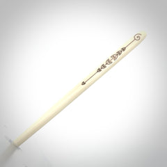 Hand carved bone hair pin with double sided koru design.